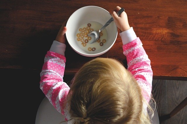 Baby having honey loops